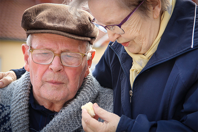 An elderly couple having lunch