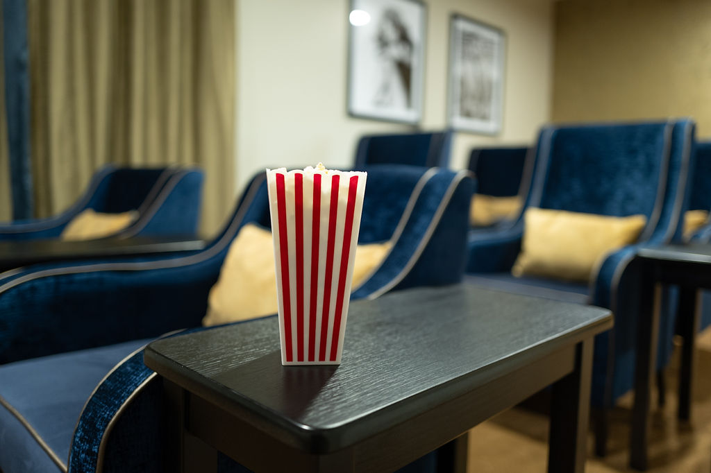 A box of popcorn in the cinema room