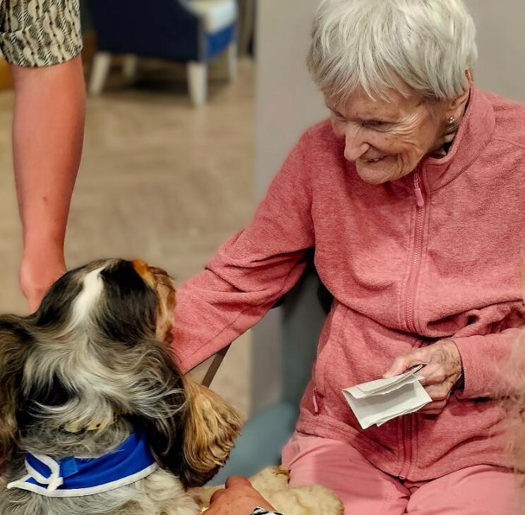 pepper the dog and a resident