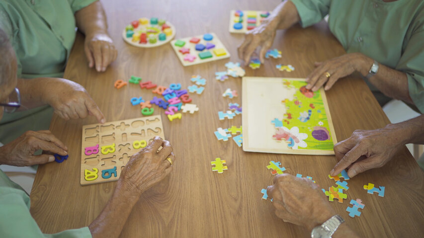 residents doing puzzle activities
